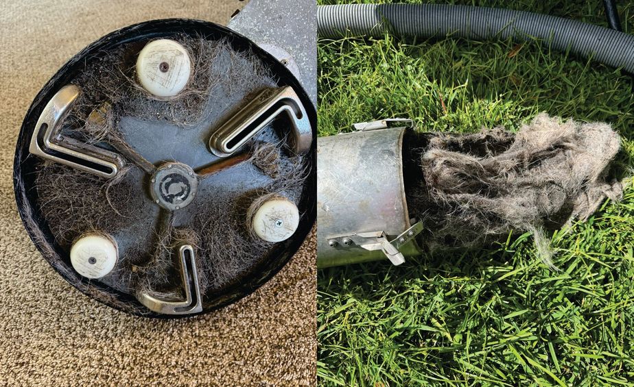 Thick mats of hair and lint packed into Mark's Rotovac cleaning head and hose after cleaning a customer's carpet